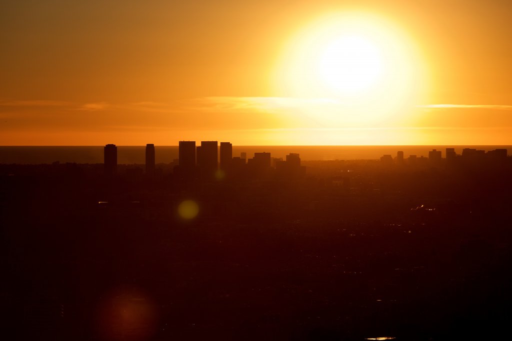 An orange sunset over Los Angeles - a must see on any California to Arizona Road Trip.