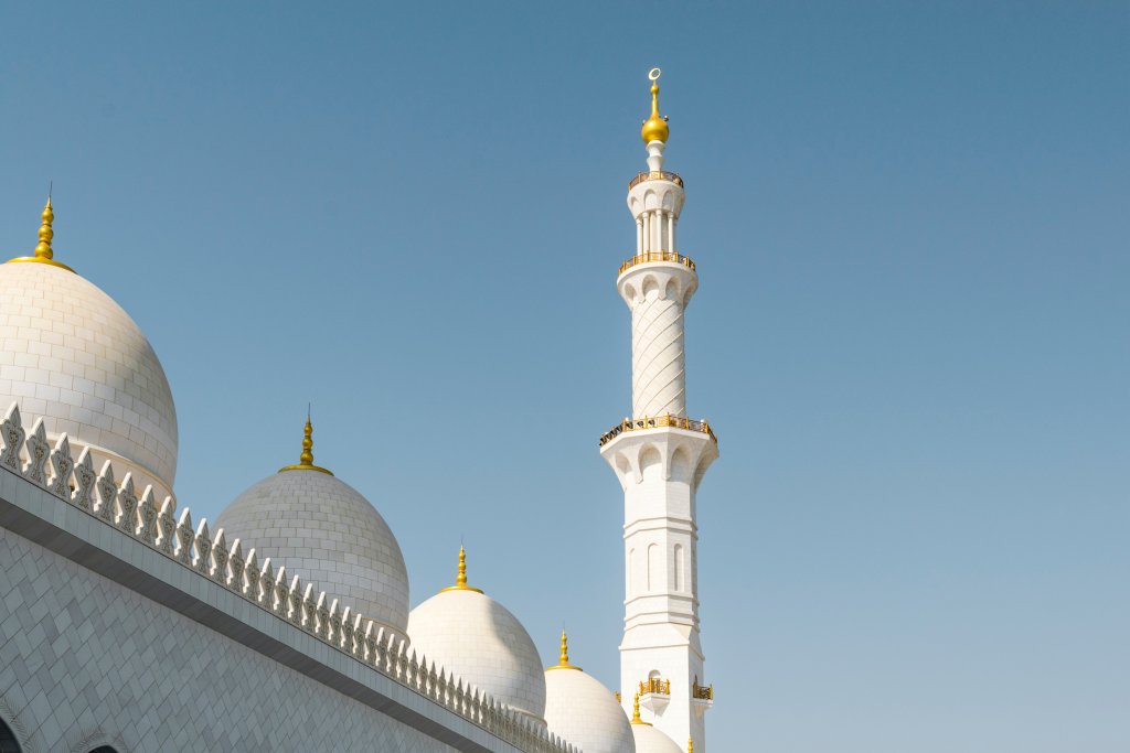 A famous mosque in UAE in front of blue skies.