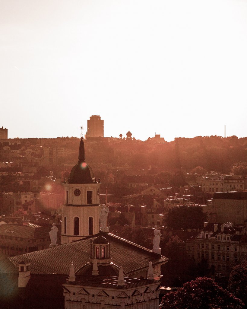 Vilnius in the sunset.  Many attractions can be seen in the distance.