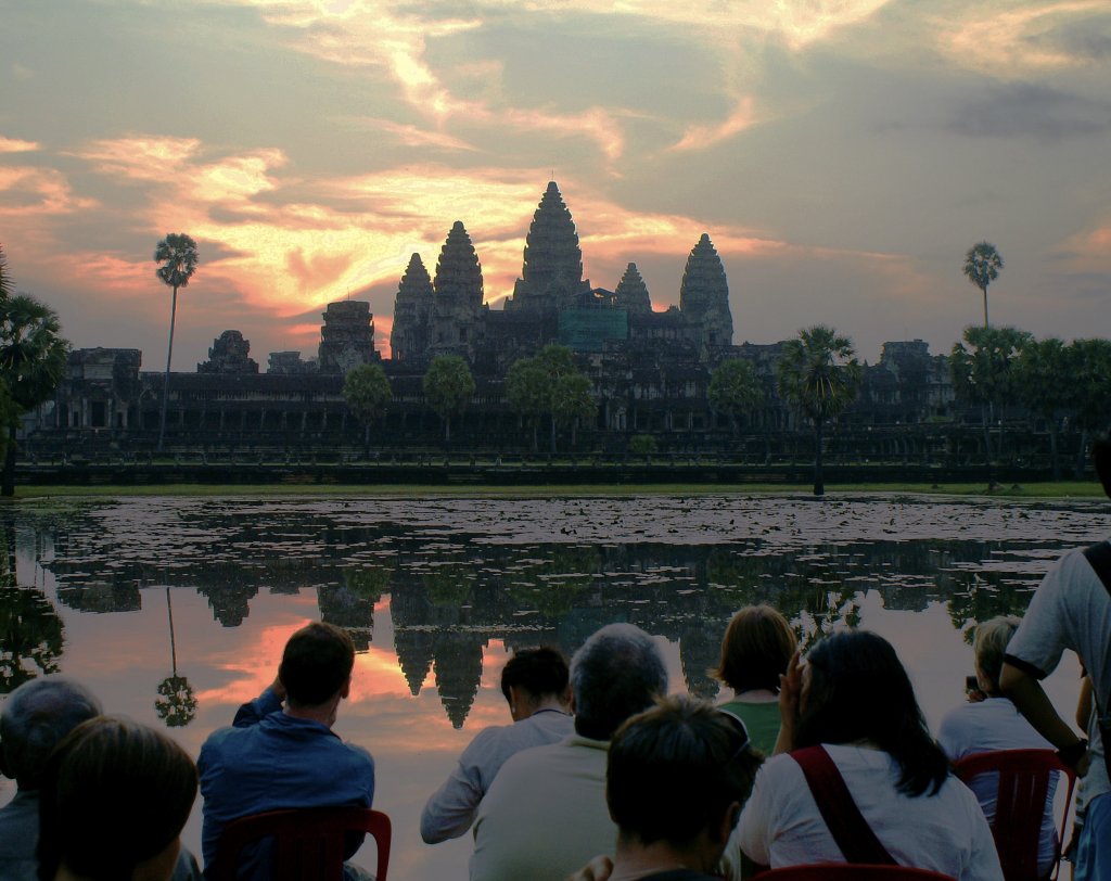 A group of photographers during sunrise at Angkor Wat.