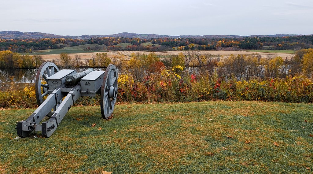 Saratoga National History Park field with a cannon on the grass.