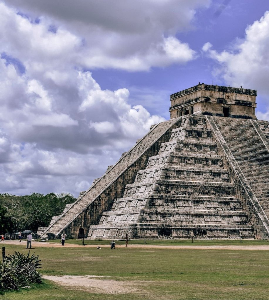 Things to Do in the Yucatan Peninsula 2 - Go to Chichen Itza.  Mayan ruins and blue sky.