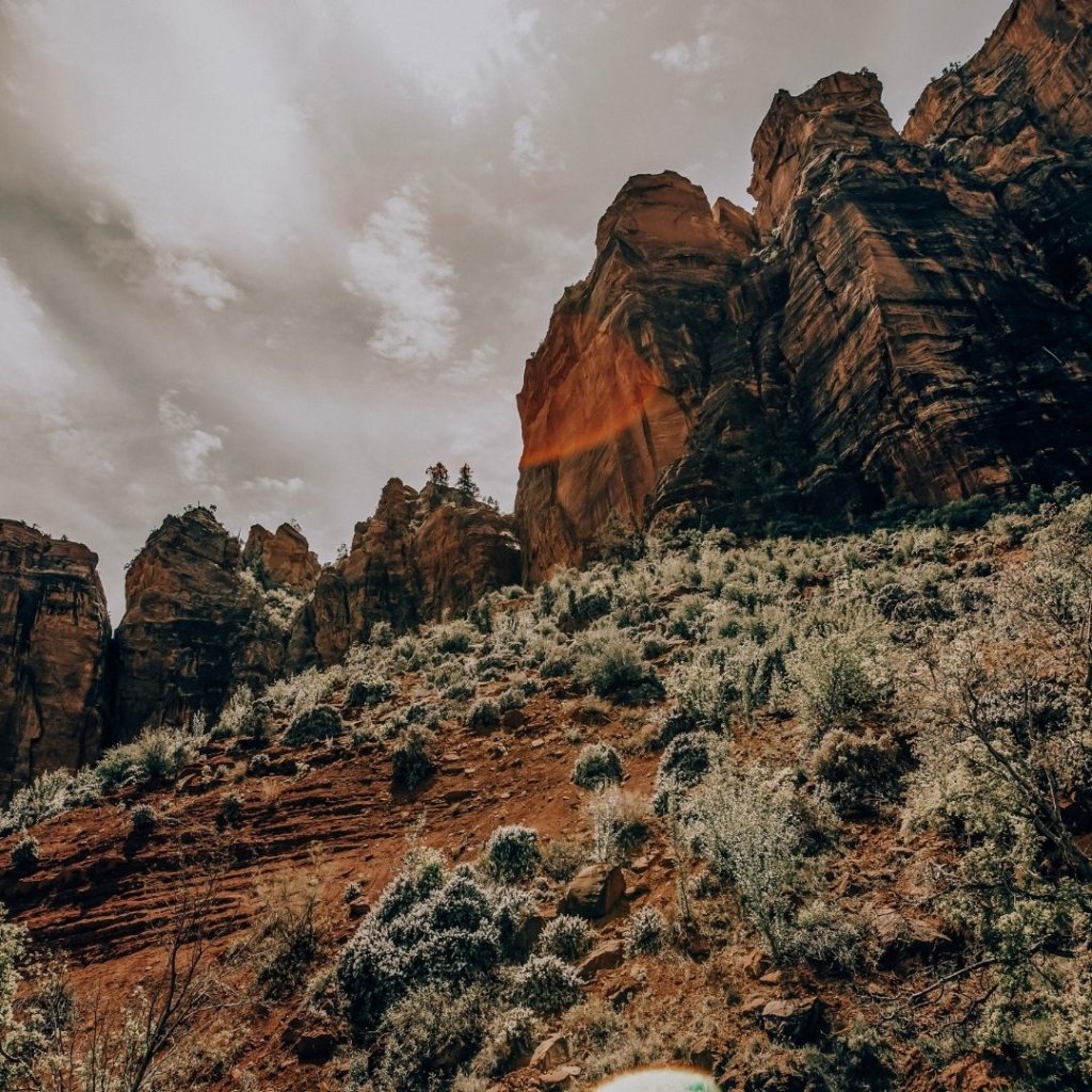 Zion mountains and cloudy skies, a great addition to your USA bucket list.