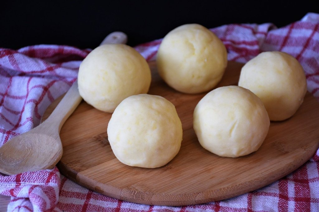 Round Cepelinai, a traditional Lithuanian food made from potato flour - and the Lithuanian national dish!