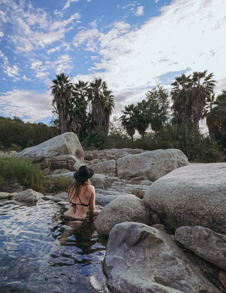 Monica in a natural pool, exploring greater Los Cabos nature.