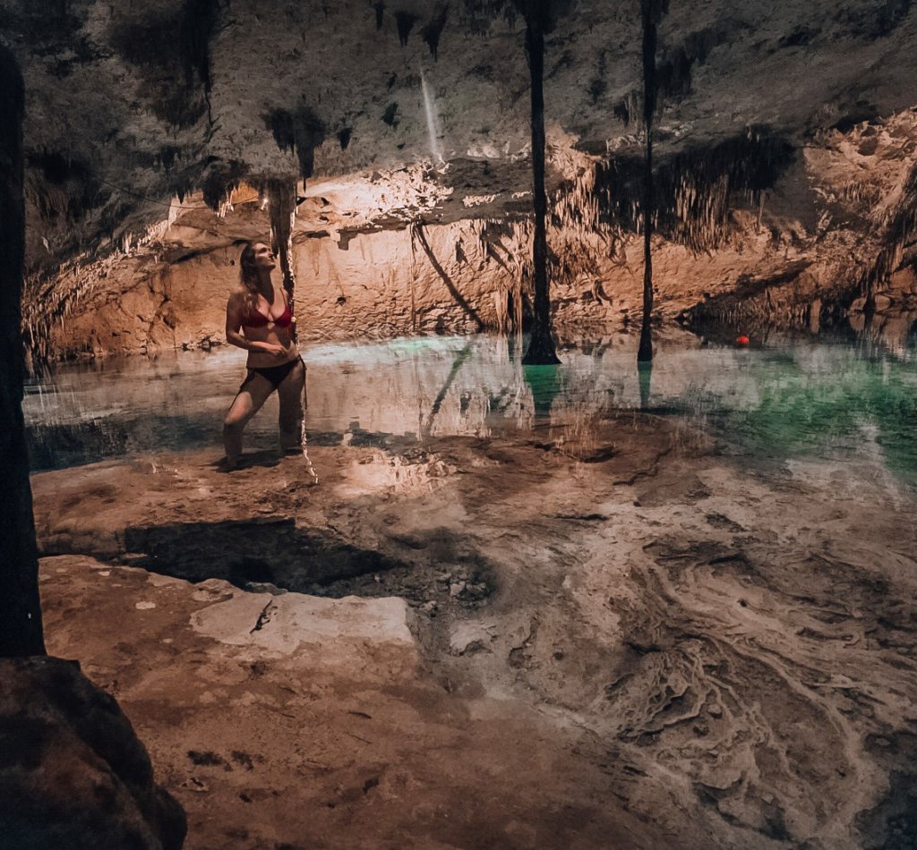 Monica enjoying the blue waters of Taak Bi Ha Cenote, solo.