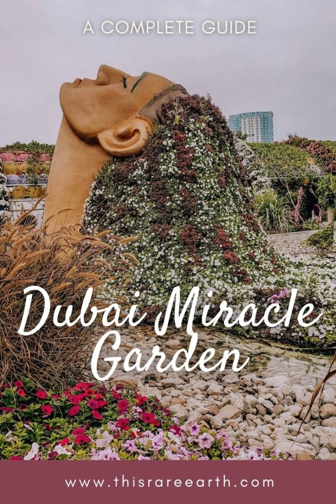 Dubai Miracle Garden Guide Pin featuring a flower sculpture.