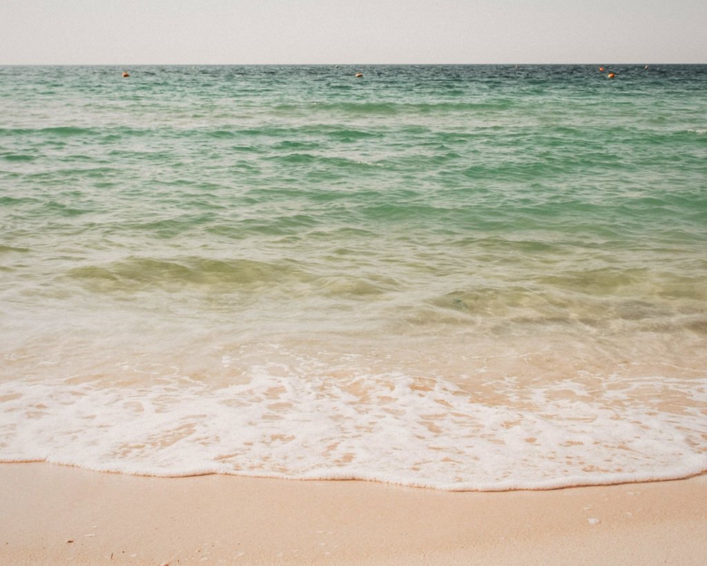 The incredible blue green water and the beach at the Arabian Sea.