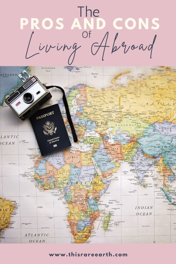 The Pros and Cons of Living Abroad Pin with map, camera, and passport.