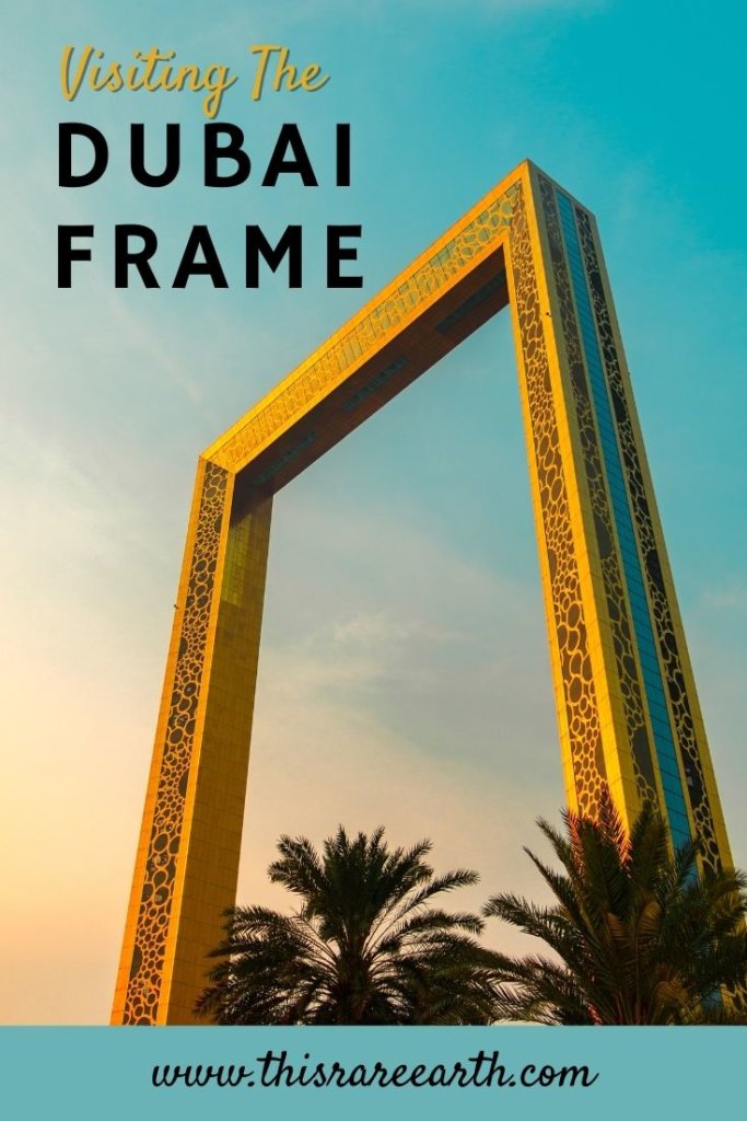 The Golden Frame in Dubai with pink skies and palm trees.