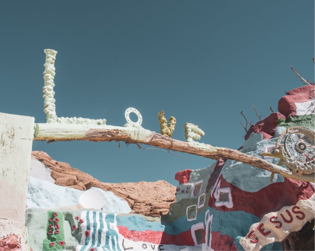 Colorful Salvation Mountain with paint covered rocks.