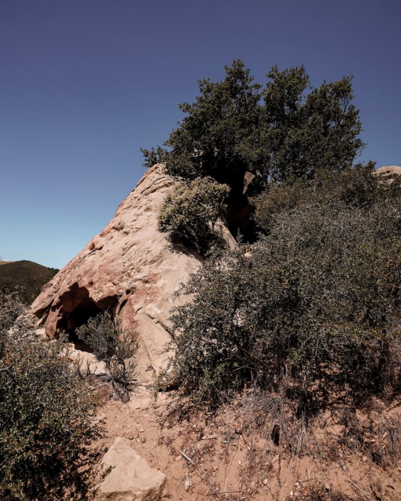 The Gaviota Wind Caves in front of blue sky.