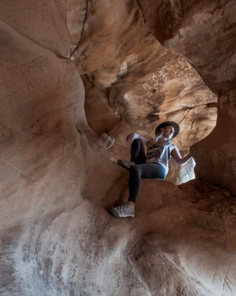 Monica inside the tunnels on The Gaviota Wind Caves Trail.