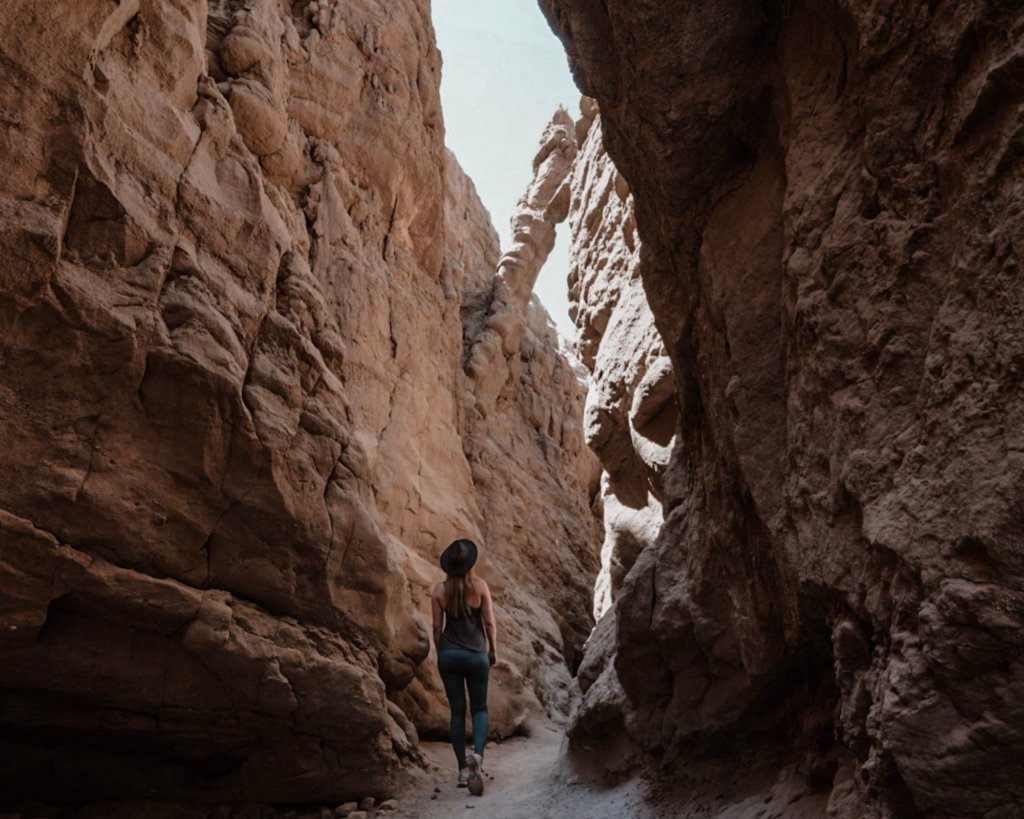 Monica hiking the Slot - one of the Anza Borrego Hikes You Cannot Miss! in Anza Borrego State Park, CA.