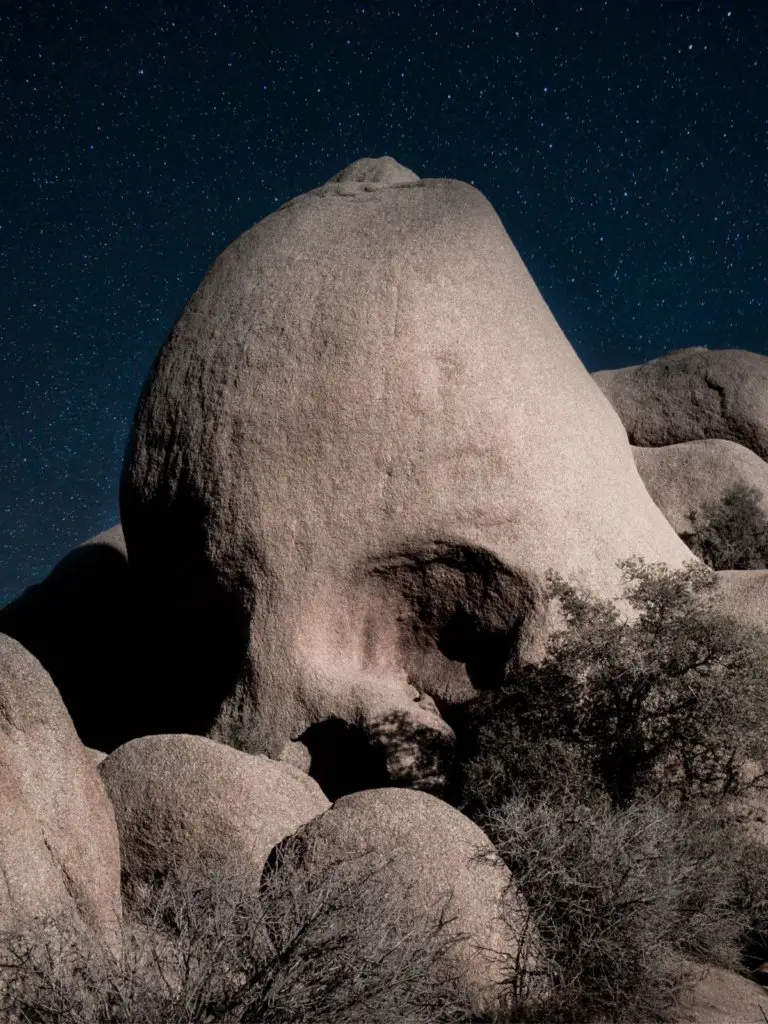 Don't skip skull rock, lit up by the stars - 10 Tips for Visiting Joshua Tree National Park.