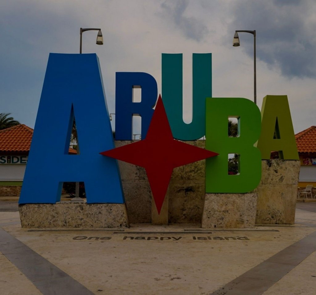 The colorful Aruba - one happy island sign.