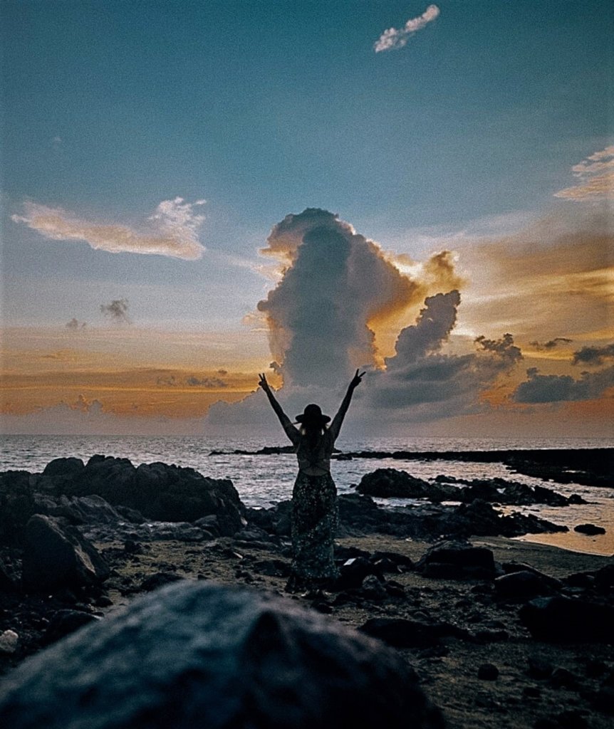 A glowing sunrise on the eastern coast - one of the Unique Things to Do in Aruba.