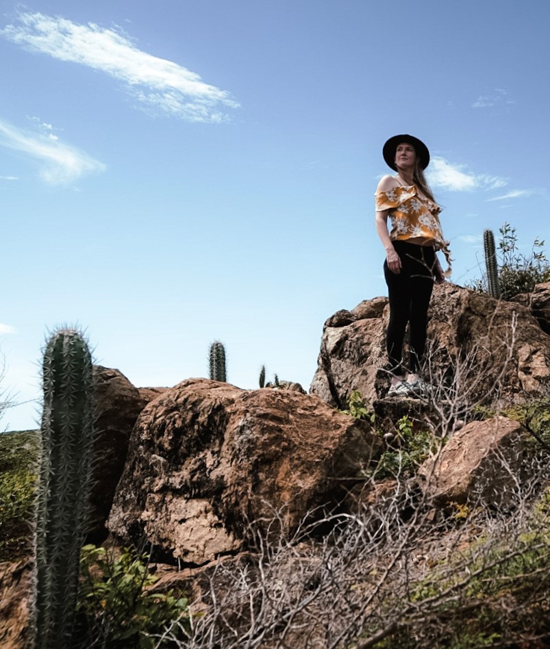 Hiking in the desert while Visiting Arikok National Park in Aruba.