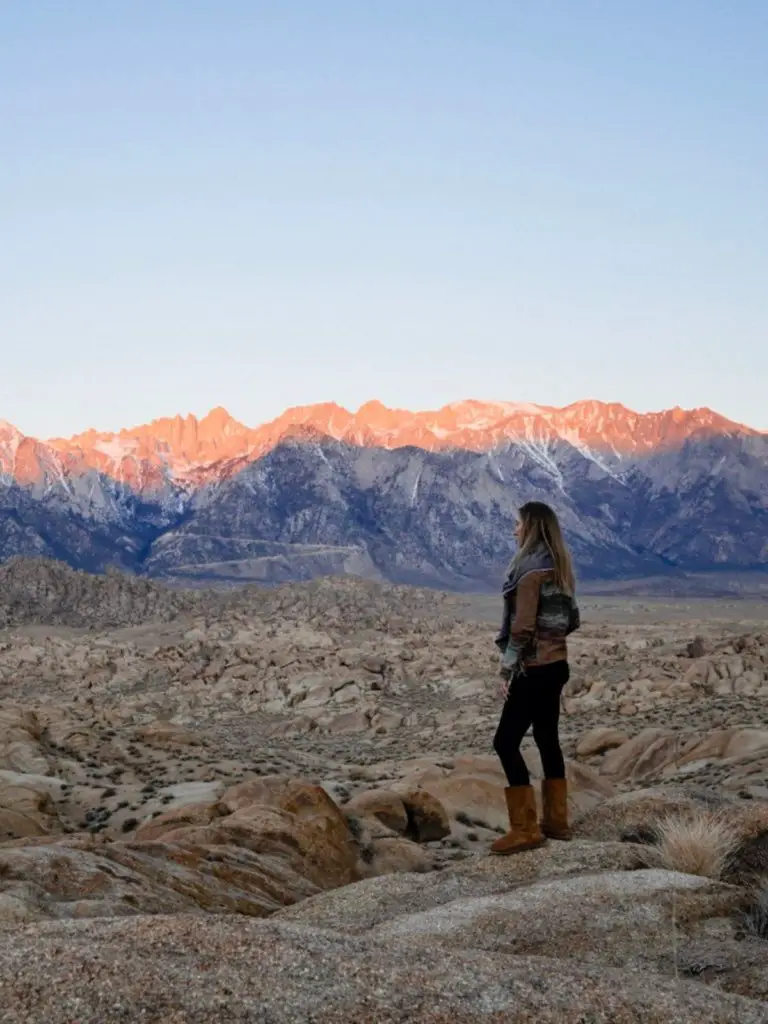 Monica at Alabama Hills at sunrise - one of the best places for Solo Female Travel in California.