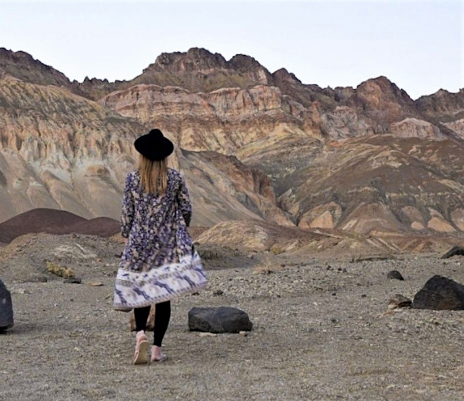 Monica looking up at the mountains on the Joshua Tree to Death Valley road trip.