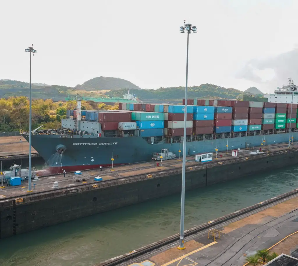 A large boat passing through the Panama Canal, a can't-miss attraction in Panama.