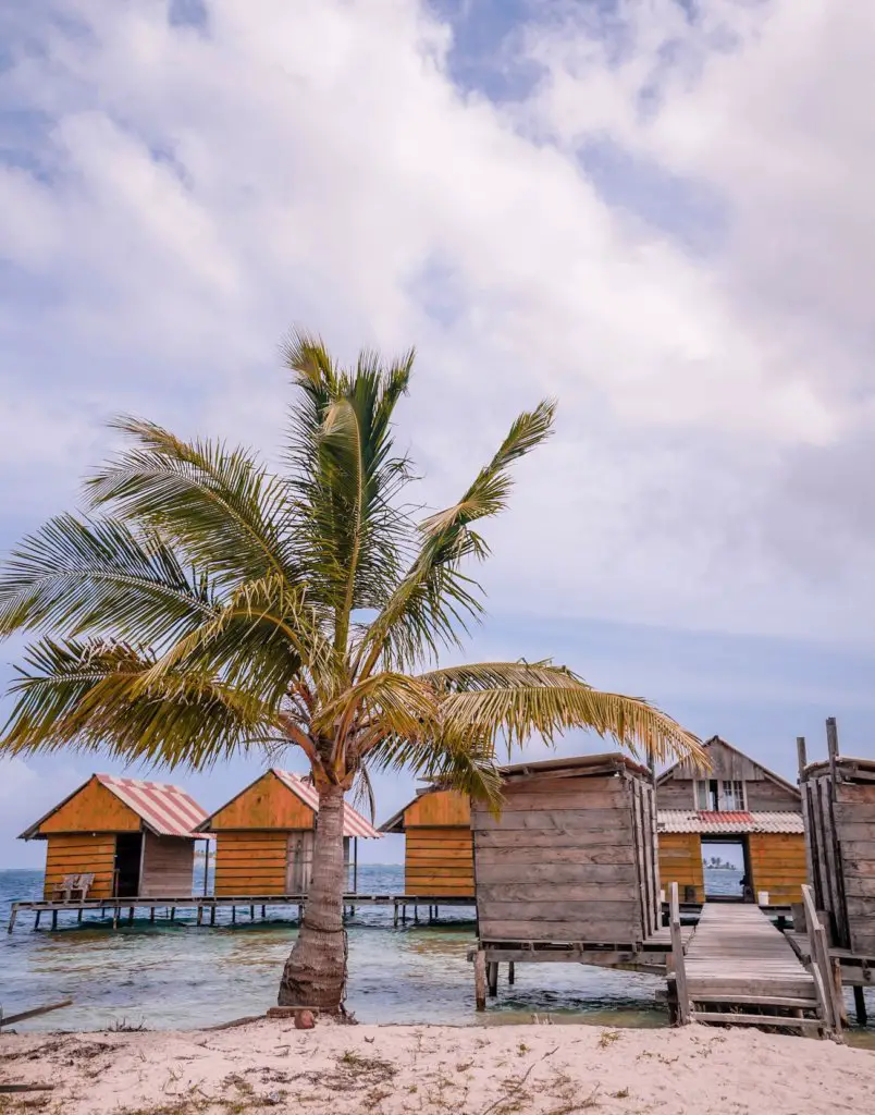 The overwater bungalows you can stay in when Visiting the San Blas Islands, Panama.