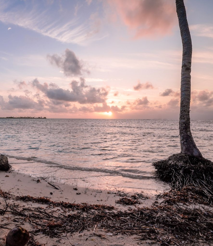 The beautiful rosy sky seen Visiting Wailidup n the San Blas Islands, Panama.