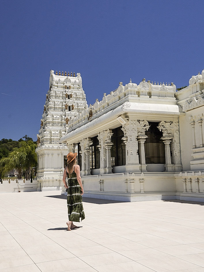 Monica visiting the white Hindu temple on her day trip to Malibu.