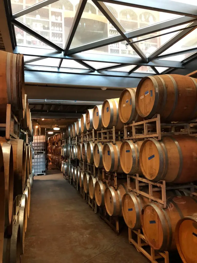 A row of wine barrels at a tasting room in Temecula - one of The Best day trips from Palm Springs.