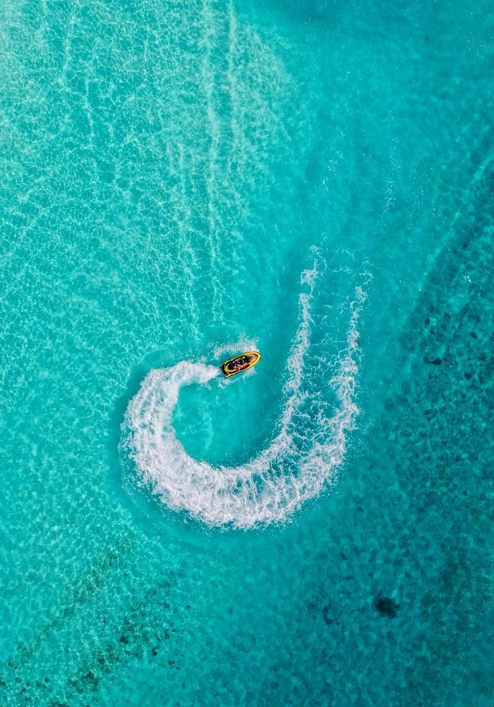 A jet ski in the clear blue water - one of the best Things to do in Cabo Mexico - Los Cabos.