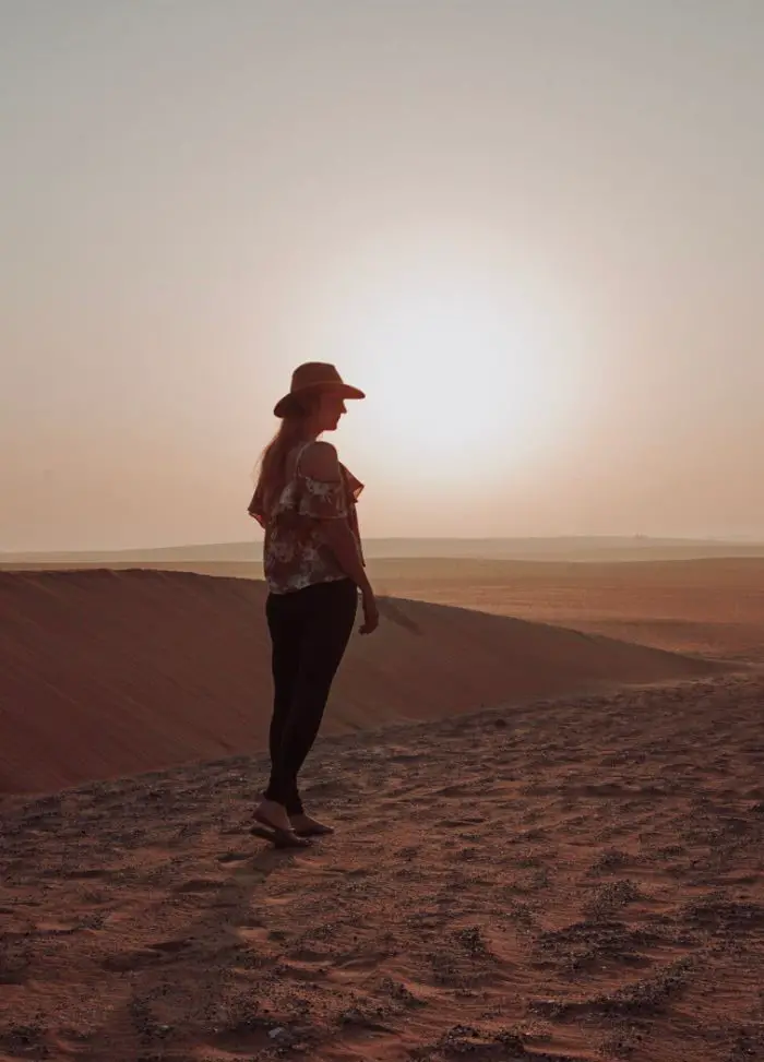 Monica at sunset in the Arabian desert.