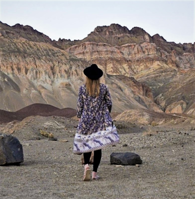 Monica in front of the mountains of Death Valley, one of the National Parks near Las Vegas.