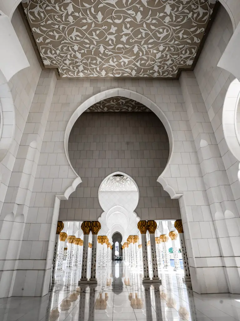 Endless ornate pillars at the Sheik Zayed Grand Mosque.