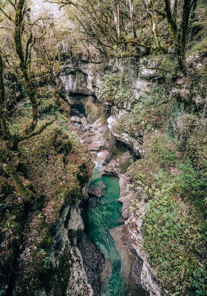 The tall gorge and blue water at Martvili Canyon, Georgia.