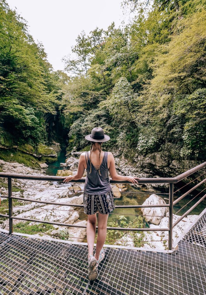 Monica on the walking path, looking out at Martvili Canyon's beautiful hues!