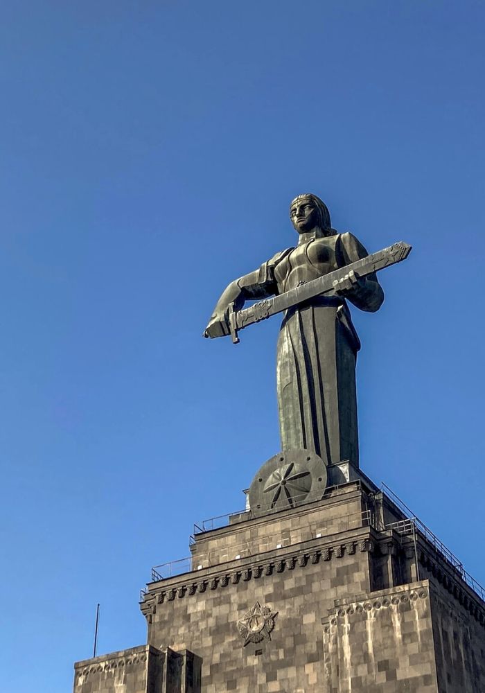 Mother Armenia towering high above the city.