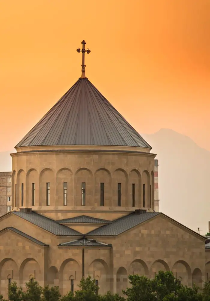 A sunset behind one of Armenia's many cathedrals.