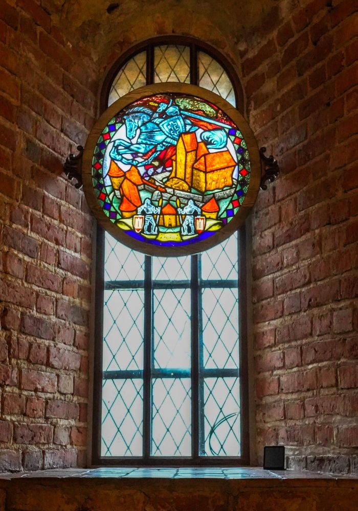 Stained glass seen inside of Trakai Island Castle in Lithuania.