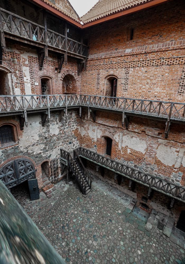 The cobblestone floor and red bricks on Trakai Castle in Lithuania.