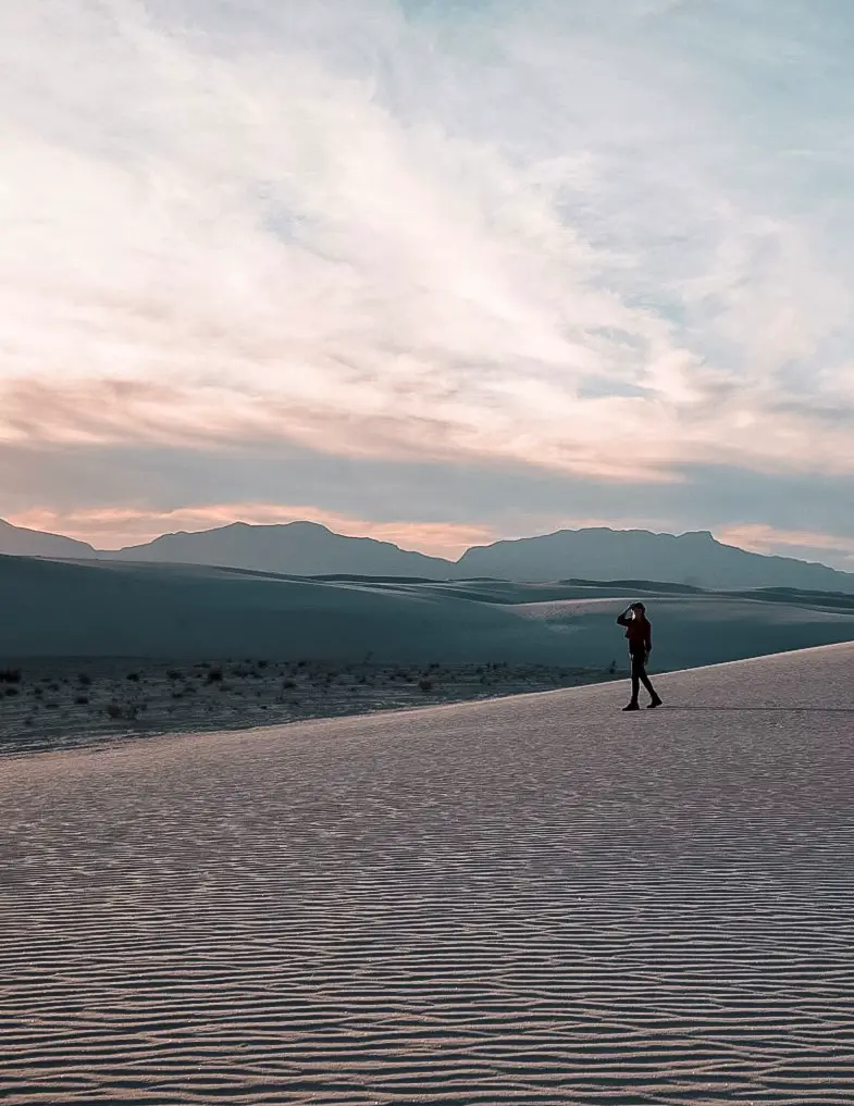 Monica walking the beautiful White Sand dunes at sunset - one of the best national parks in the southwest!  
