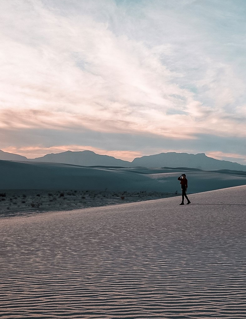 Monica making use of The Best Hiking Gear for Women at sunset.