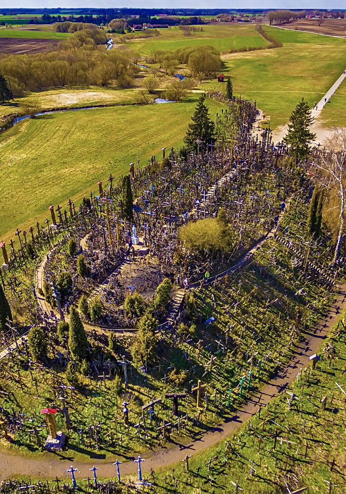 Visit the Hill of Crosses in Lithuania