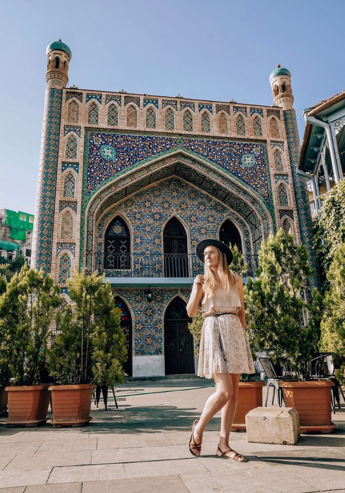 Monica walking around the Sulfur Bath area, one of The Best Things to Do in Tbilisi, Georgia.