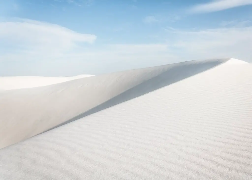 The stark white dunes on a desert hike, one of the best Things to Do in White Sands National Park, New Mexico.