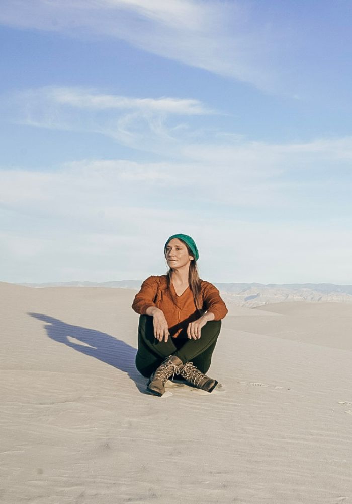 Monica on the dunes, one of the best Things to Do in White Sands National Park, New Mexico.