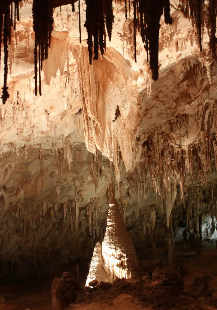 Stalactites and stalagmites inside of Carlsbad Caverns, one of your New Mexico Road Trip stops.