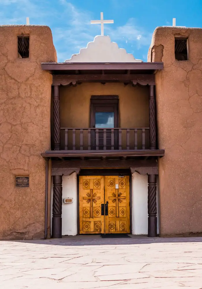 The typical textured adobe facades seen in Taos, one of your New Mexico Road Trip stops.
