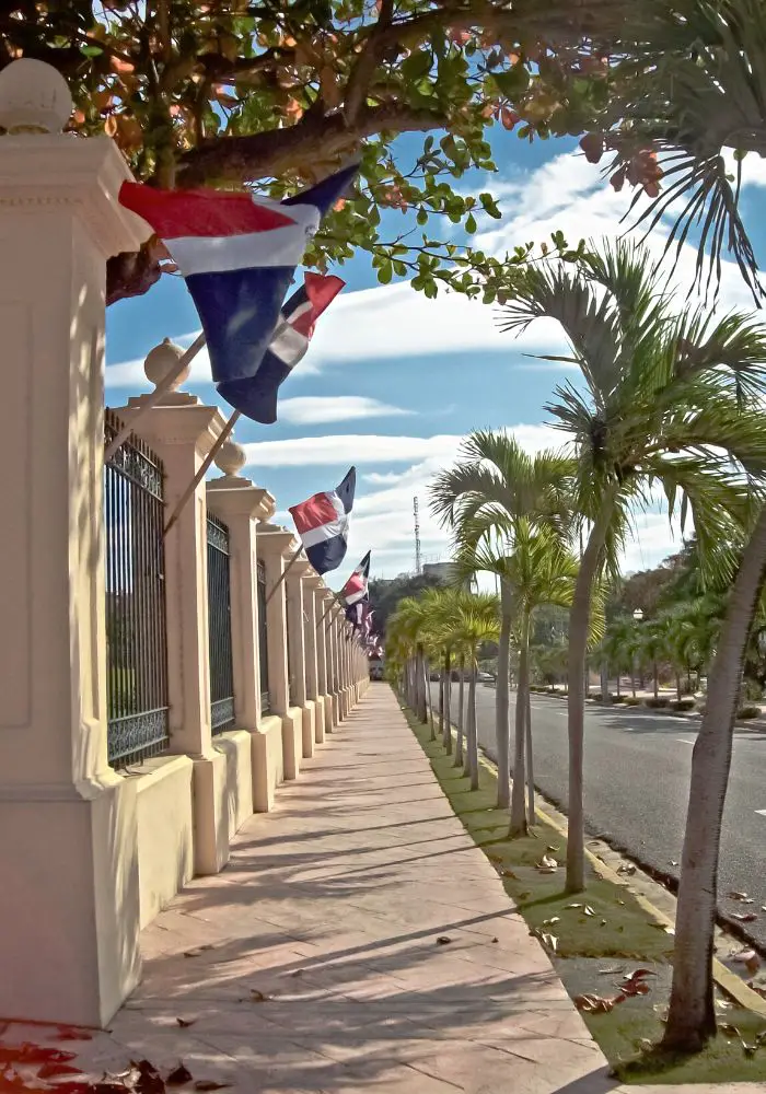 Is Santo Domingo Safe? Dominican Republic flags and walkway.