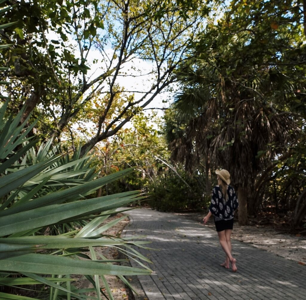 Monica walking the entire island when Visiting Peanut Island, Florida.
