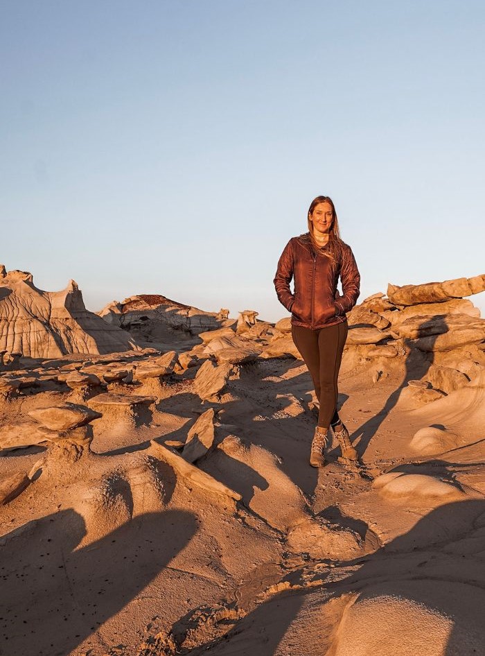 Monica in her favorite cold weather jacket, one of the items on the list of The Best Hiking Gear for Women.